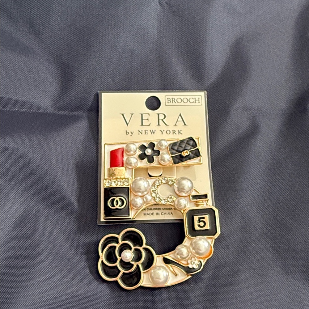 Gold and Black Brooch